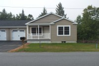A photo of a three bedroom one level condo in Barre Town Vermont.